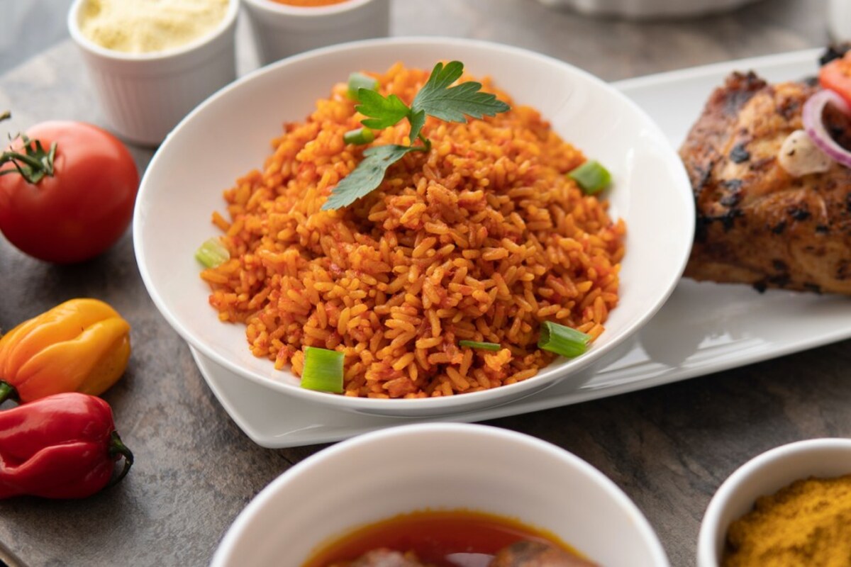 Ufondu Kitchen Pan-African feast spread with jollof rice, grilled fish, suya, plantain and fresh salads